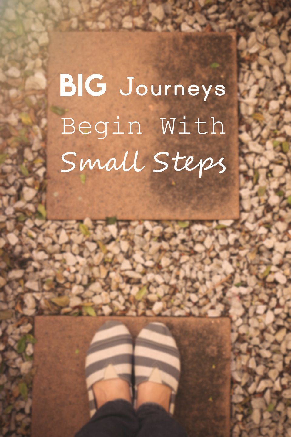 Typography Inspirational positive quotation "Big journeys begin with small steps"